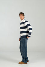 Polo rugby WEARINGSVQ azul y blanco para chico – vista lateral